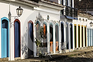 Typical facades with colorful doors in historic town Paraty, Brazil