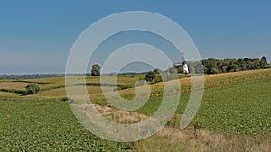 Typical flemish ardennes farmscape with historic windmill photo