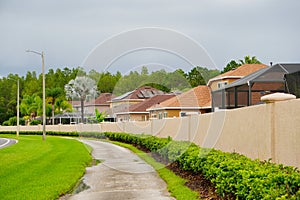 A typical Florida community, wall and road