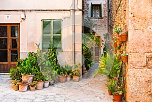 Typical flower pots decoration in Valldemossa village on Majorca, Spain