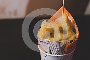 Typical French fries, deep fried Homemade Baked potato chips. Close up with traditional dutch spicy sauce