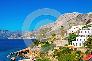 Typical Greek houses on coast of Aegean Sea Greece