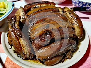 Typical Hakka Chinese dish, upturned pork bowl.