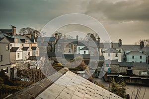 Typical houses in a derry suburb viewed from a high window or roof terrace. Nice white houses in line above the city of Derry or