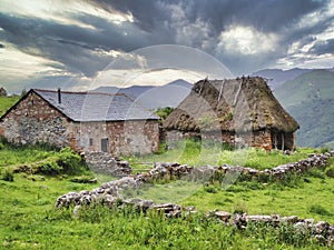 Typical huts in brana Mumian, Somiedo Natural Park, Asturias, Spain photo