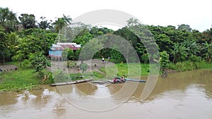 Typical indigene village along the Amazon River in the Amazonia Rain Forest South America