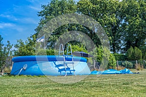 Typical inflatable swimming pool in the garden