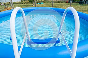 Typical inflatable swimming pool in the garden