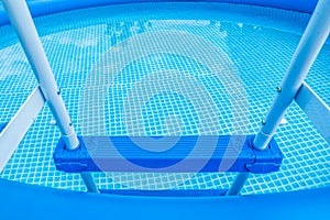 Typical inflatable swimming pool in the garden