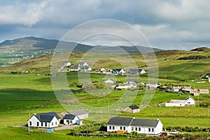 Typical Irish houses at Malin Head, Ireland\'s northernmost point, famous Wild Atlantic Way, spectacular coastal route.