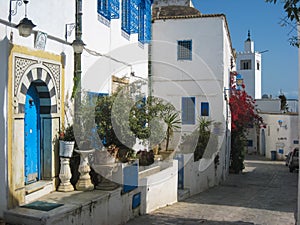 Picturesque street in the medina. Sidi Bou Said. Tunisia photo