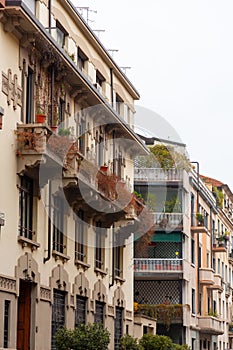 Typical Italian buildings and street view in Milan, Lombardy Italy