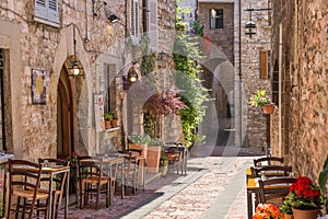 Typical Italian restaurant in the historic alley photo