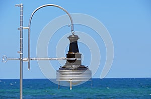 Typical lamp used on boats background of the sky photo