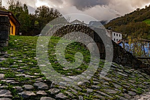 Medieval bridge over the Villoria river photo