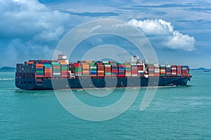 Typical large boxship in design and layout have a twin-island design, with the accommodation, including the navigation bridge, photo