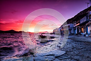 The typical little village of Klima in Milos island Greece at sunset.