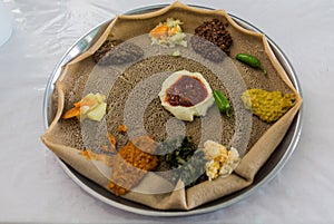 Typical meal in Ethiopia - Beyainatu. Meaing bit of everything. Mix of vegetables and stews on injera flatbrea