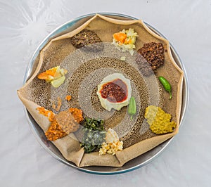 Typical meal in Ethiopia - Beyainatu. Meaing bit of everything. Mix of vegetables and stews on injera flatbrea