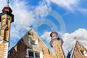 Typical medieval buildings along the canals of the city of Bruges, West Flanders, Belgium photo