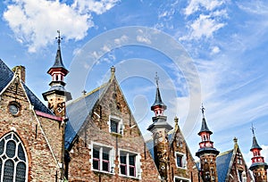 Typical medieval buildings along the canals of the city of Bruges, West Flanders, Belgium photo