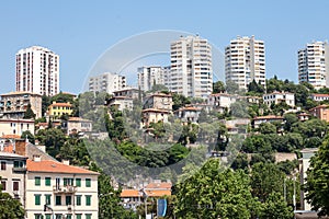 Typical mediterranean architecture with individual houses and housing skyscraper towers in Rijeka, on the adriatic coast