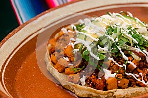 Traditional mexican sope with chorizo photo