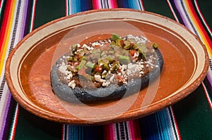 Traditional mexican sope with blue tortilla photo