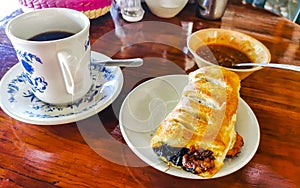 Typical Mexican dishes Empanadas Tamales Rollos with Coffee Oaxaca Mexico photo