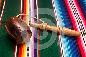 Traditional mexican balero and tapete