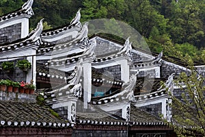 Typical Miao decorations on the roofs of Old Houses in Fenghuang ancient town, China