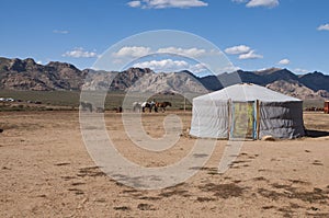 Nomadic yurt in desert photo