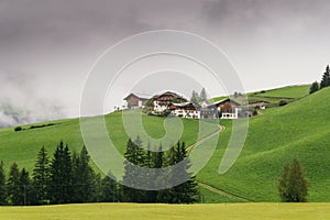 Typical mountain houses on a hill in Alto Adige / South Tyrol, Italy