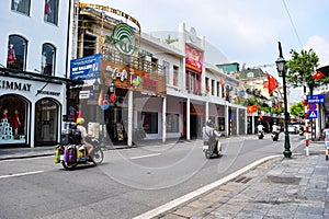 Typical narrow colorful and beautiful houses in the street of Hanoi. Ha Noi is the capital and the second largest city in Vietnam