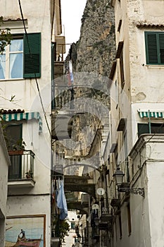 Typical narrow street of Italy photo