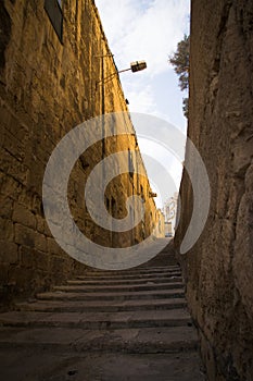 Typical narrow street with stairs in the city Valetta