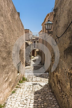 Typical narrow street in village of Forza d'Agro, Sicily