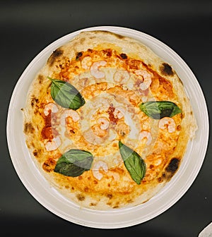 typical Neapolitan pizza with prawns made with sourdough