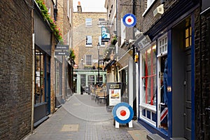 Typical Newburgh street with brick houses and pub in London