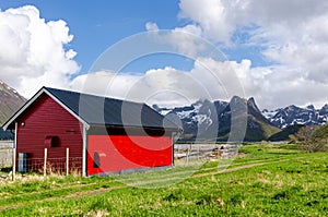A typical Norwegian falu red wooden cottage. photo