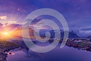 The Typical Norwegian fishing village of Reine under midnight sun