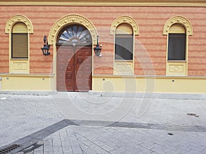 Typical Novi Sad old town street view in Serbia with old doors and windows and vintage candelabre