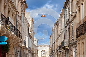 Typical old French residential buildings in Bordeaux, France, made of freestone, hosting flats,