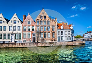 Canal in Bruges with beautiful Belgian brick houses.