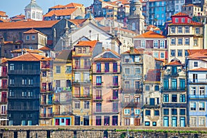 Typical old houses with colorful facades at Ribeira district, Porto, Portugal photo