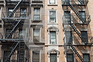 The typical old houses with fire stairs in New York