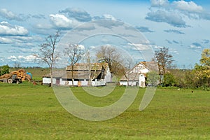 Typical old salas in Vojvodina, a traditional type of property in the Pannonian Plain region, with family house and agricultural