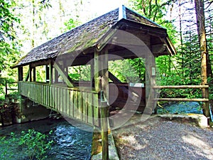 A typical old wooden bridge over the Thur River in the Toggenburg region, Neu St. Johann - Canton of St. Gallen, Switzerland