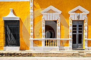 Typical old yellow house at the magical town of Izamal in Yucatan