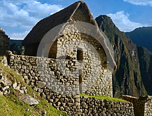 A typical perfectly preserved stone house, which is part of the ancient ruins of the Inca city of Machu Picchu in Peru